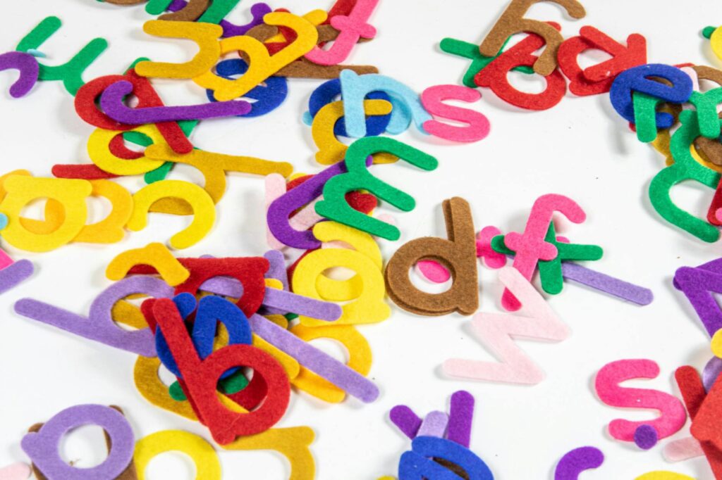 assorted colorful cutouts of alphabet